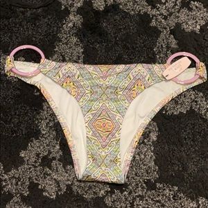 BATHING SUIT BOTTOM WITH METAL HIP RINGS